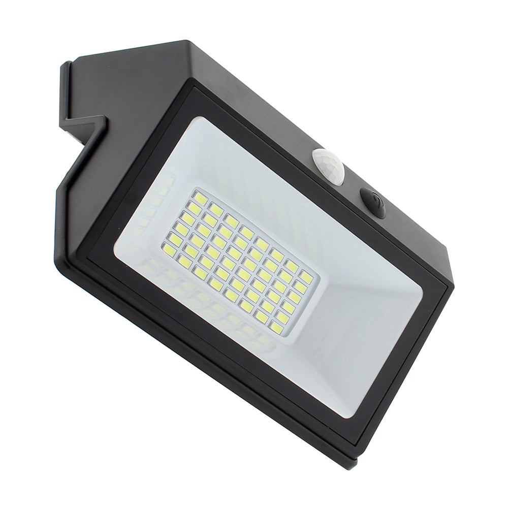 Foco de pared LED "todo en 1" de 20W de potencia y placa LED solar integrada. Incorpora sensor de movimiento y luminosidad. 