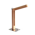 La lámpara de mesa CARFI en una Lámpara Led de Mesa fabricada en madera de aliso y luminaria led con sensor táctil y regulador de intensidad. Con una altura de 40cm y totalmente orientable en cualquier posición.
