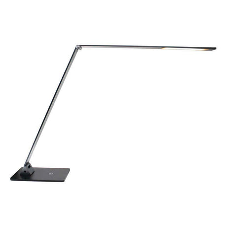 Lámpara de escritorio, flexo Led, de grandes dimensiones con dos brazos articulados y luminaria led de LG de alta potencia, conector USB para carga de dispositivos integrado en la base. Con un diseño estilizado, moderno y funcional, realizado con materiales de la más alta calidad en acero y aluminio. su brazo flexible permite dirigir su haz de luz en cualquier dirección.
