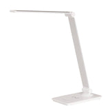 Lámpara de escritorio de brazo abatible y luminaria led de de alta potencia, botonera táctil con selector de intensidad. Con un diseño estilizado, moderno y funcional, realizado con materiales de alta calidad, su brazo articulado permite dirigir su haz de luz en cualquier dirección. Incorpora cargador inalámbrico IQ en la base. 