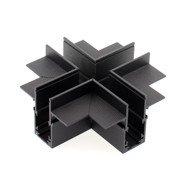Pieza en forma de X para conectar dos tramos de carril magnético empotrado.