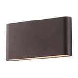 Luminaria led realizada en aluminio de gran calidad y lacado en color gris pavonado para la iluminación de paramentos verticales. Emite un haz de luz sin emisión de calor y gran eficiencia. Lámpara ideal para combinar diferentes tipos de iluminación tanto en interiores como en exteriores.