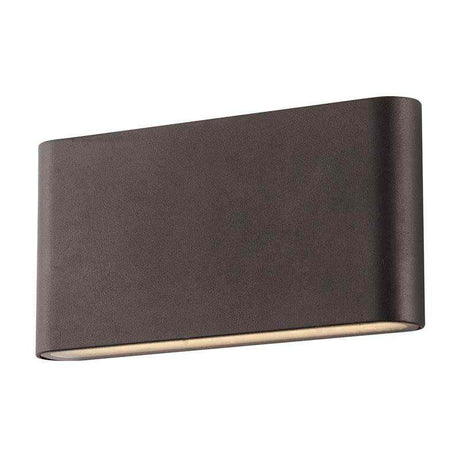 Luminaria led realizada en aluminio de gran calidad y lacado en color gris pavonado para la iluminación de paramentos verticales. Emite un haz de luz sin emisión de calor y gran eficiencia. Lámpara ideal para combinar diferentes tipos de iluminación tanto en interiores como en exteriores.