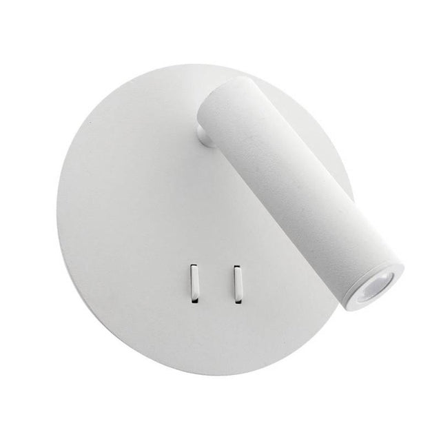Luminaria LED realizada en aluminio de gran calidad y lacado en color blanco con iluminación de lectura y ambiental. Emite un haz de luz dirigida en cualquier dirección y un haz de luz perimetral para dar iluminación ambiental sin emisión de calor y gran eficiencia. Se puede instalar junto a la cama o sobre ella y sustituir así a una lámpara de mesa de noche. La lámpara se enciende y apaga mediante un interruptor incorporado en el soporte de pared.