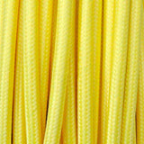 Cable eléctrico textil. Consta de dos hilos de sección 2x0,75mm y aislamiento de PVC. Capacidad de corriente de 6A.