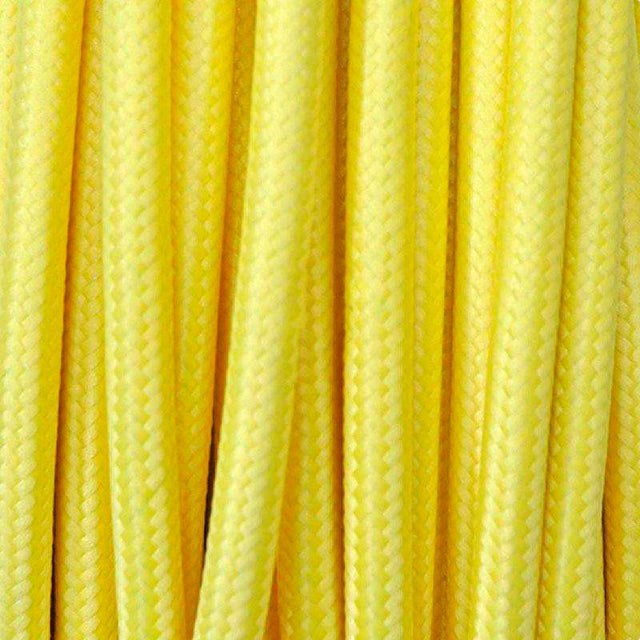 Cable eléctrico textil. Consta de dos hilos de sección 2x0,75mm y aislamiento de PVC. Capacidad de corriente de 6A.