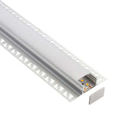 Perfil fabricado en aluminio de alta calidad ideal para iluminación de cualquier ambiente (baños, cocinas, pasillos, salones, etc) Se instala en obra entre el pladur, yeso, azulejos, etc. Dispone de aletas troqueladas que facilita la inserción del cemento u otro material para asegurar así un agarre perfecto a la pared.