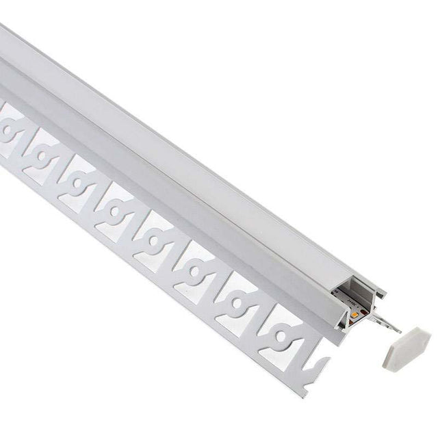 Perfil fabricado en aluminio de alta calidad ideal para iluminación de cualquier ambiente (baños, cocinas, pasillos, salones, etc) Se instala en obra entre el pladur, yeso, azulejos, etc. Dispone de aletas troqueladas que facilita la inserción del cemento u otro material para asegurar así un agarre perfecto a la pared.