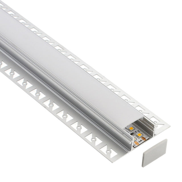 Perfil fabricado en aluminio de alta calidad ideal para iluminación de cualquier ambiente (baños, cocinas, pasillos, salones, etc) Se instala en obra entre el pladur, yeso, azulejos, etc. Dispone de aletas troqueladas que facilita la inserción del cemento u otro material para asegurar así un agarre perfecto a la pared.