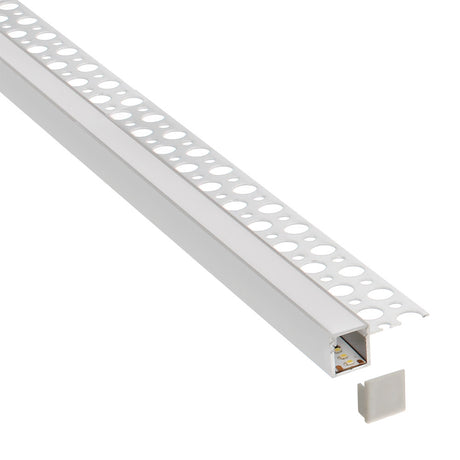 Perfil fabricado en aluminio de alta calidad ideal para iluminación de cualquier ambiente (baños, cocinas, pasillos, salones, etc) Se instala en obra entre el pladur, yeso, azulejos, etc. Dispone de aletas troqueladas que facilita la inserción del cemento u otro material para asegurar así un agarre perfecto a la pared.