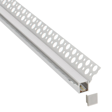 Perfil fabricado en aluminio de alta calidad ideal para iluminación de cualquier ambiente (baños, cocinas, pasillos, salones, etc) Se instala en obra entre el pladur, yeso, azulejos, etc. Dispone de aletas troqueladas que facilita la inserción del cemento u otro material para asegurar así un agarre perfecto a la pared.