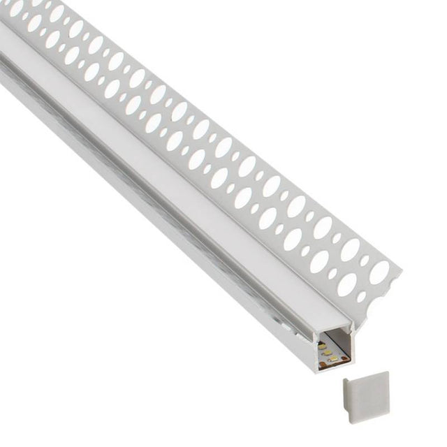 Perfil fabricado en aluminio de alta calidad ideal para iluminación de cualquier ambiente (baños, cocinas, pasillos, salones, etc) Se instala en obra entre el pladur, yeso, azulejos, etc. Dispone de aletas troqueladas que facilita la inserción del cemento u otro material para asegurar así un agarre perfecto a la pared.