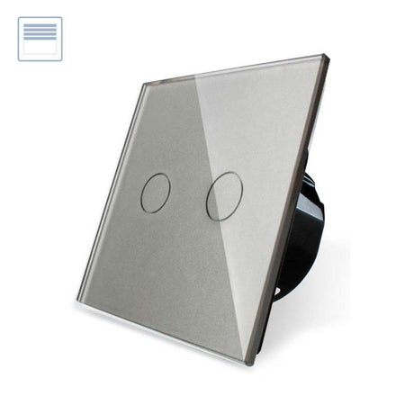 Interruptor sencillo de 1 cuerpo con 2 botones en color gris con función de persiana, permite subir y bajar persianas y otros elementos de la casa. Interruptor eléctrico de empotrar con cuerpo de aluminio y panel frontal táctil iluminado de cristal templado con acabado de alta calidad y diseño minimalista.