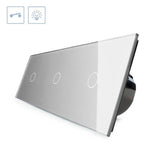 Interruptor de 3 módulos con 3 encendidos en color gris. Interruptor eléctrico de empotrar con cuerpo de aluminio y panel frontal táctil iluminado de cristal templado con acabado de alta calidad y diseño minimalista.