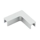 Fijación L para la composición de iluminación modular de vitrinas VITRA.