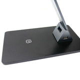 Lámpara de escritorio, flexo Led, de grandes dimensiones con dos brazos articulados y luminaria led de LG de alta potencia, conector USB para carga de dispositivos integrado en la base. Con un diseño estilizado, moderno y funcional, realizado con materiales de la más alta calidad en acero y aluminio. su brazo flexible permite dirigir su haz de luz en cualquier dirección.