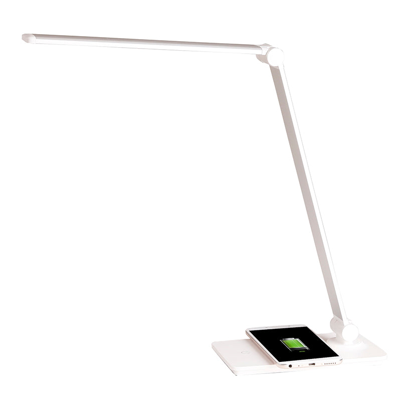 Lámpara de escritorio de brazo abatible y luminaria led de de alta potencia, botonera táctil con selector de intensidad. Con un diseño estilizado, moderno y funcional, realizado con materiales de alta calidad, su brazo articulado permite dirigir su haz de luz en cualquier dirección. Incorpora cargador inalámbrico IQ en la base. 