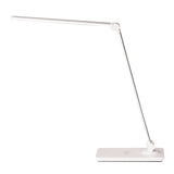 Lámpara de escritorio de brazo abatible y luminaria led de de alta potencia, botonera táctil con selector de intensidad. Con un diseño estilizado, moderno y funcional, realizado con materiales de alta calidad, su brazo articulado permite dirigir su haz de luz en cualquier dirección. Incorpora cargador inalámbrico IQ en la base. 