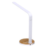 <b>Flexo LED escritorio</b> WOOD Multifunción. Lámpara de escritorio multifunción con doble cargador USB, botonera táctil, temporizador y selector de color de luz. Con un diseño estilizado, moderno y funcional, realizado con materiales de alta calidad y chip led Osram de alta potencia. Orientable en cualquier posición.
