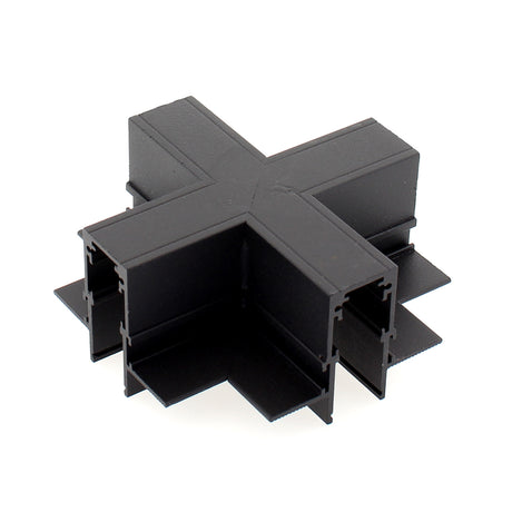 Pieza en forma de X para conectar dos tramos de carril magnético empotrado.