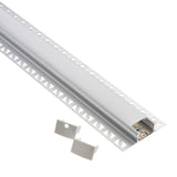 Perfil fabricado en aluminio de alta calidad ideal para iluminación de cualquier ambiente (baños, cocinas, pasillos, salones, etc) Se instala en obra entre el pladur, yeso, azulejos, etc. Dispone de aletas troqueladas que facilita la inserción del cemento u otro material para asegurar así un agarre perfecto a la pared.