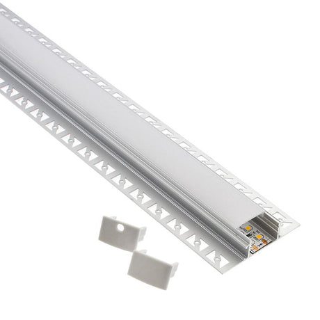 Perfil fabricado en aluminio de alta calidad ideal para iluminación de cualquier ambiente (baños, cocinas, pasillos, salones, etc) Se instala en obra entre el pladur, yeso, azulejos, etc. Dispone de aletas troqueladas que facilita la inserción del cemento u otro material para asegurar así un agarre perfecto a la pared.