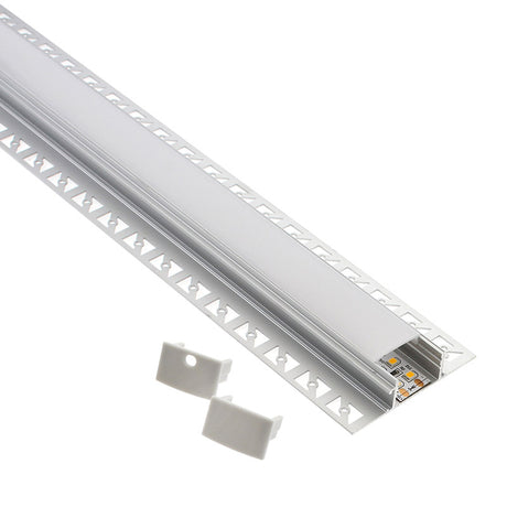 Perfil fabricado en aluminio de alta calidad ideal para iluminación de cualquier ambiente (baños, cocinas, pasillos, salones, etc) Se instala en obra entre el pladur, yeso, azulejos, etc. Dispone de aletas troqueladas que facilita la inserción del cemento u otro material para asegurar así un agarre perfecto a la pared.