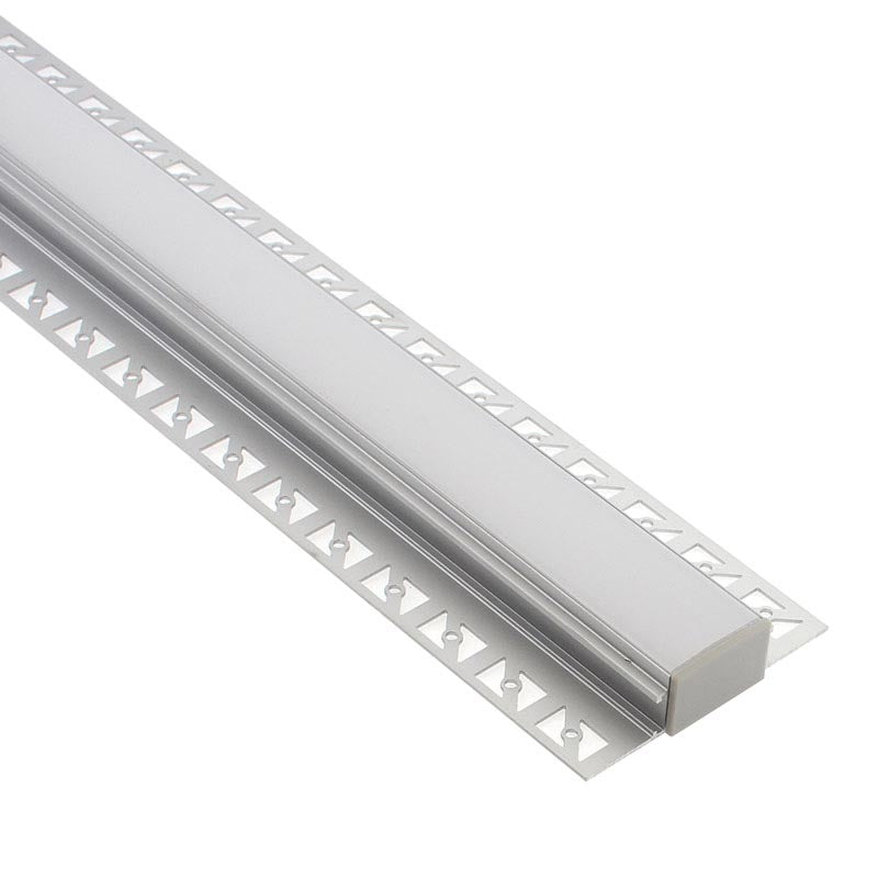 Perfil fabricado en aluminio de alta calidad ideal para iluminación de cualquier ambiente (baños, cocinas, pasillos, salones, etc) Se instala en obra entre el pladur, yeso, azulejos, etc. Dispone de aletas troqueladas que facilita la inserción del cemento u otro material para asegurar así un agarre perfecto a la pared.