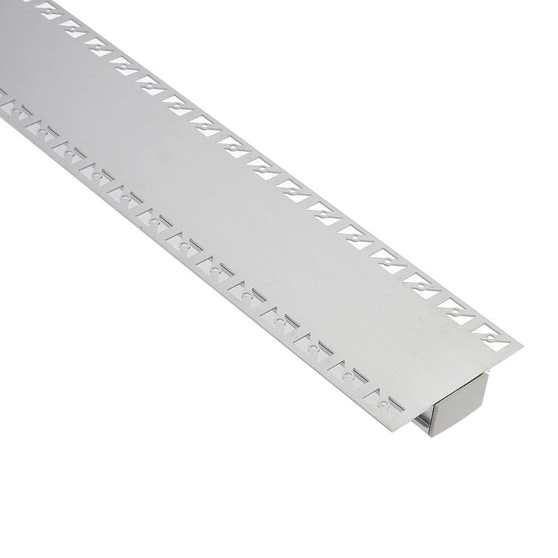 Perfil fabricado en aluminio de alta calidad ideal para iluminación de cualquier ambiente (baños, cocinas, pasillos, salones, etc) Se instala en obra entre el pladur, yeso, azulejos, etc. Dispone de aletas troqueladas que facilita la inserción del cemento u otro material para asegurar así un agarre perfecto a la pared.