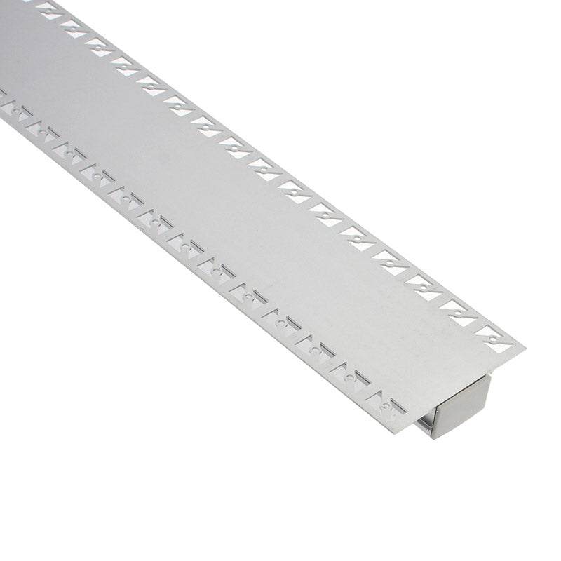 Perfil fabricado en aluminio de alta calidad ideal para iluminación de cualquier ambiente (baños, cocinas, pasillos, salones, etc) Se instala en obra entre el pladur, yeso, azulejos, etc. Dispone de aletas troqueladas que facilita la inserción del cemento u otro material para asegurar así un agarre perfecto a la pared.