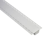 Perfil fabricado en aluminio de alta calidad ideal para iluminación de cualquier ambiente (baños, cocinas, pasillos, salones, etc) Se instala en obra entre el pladur, yeso, azulejos, etc. Dispone de aletas troqueladas que facilita la inserción del cemento u otro material para asegurar así un agarre perfecto a la pared.