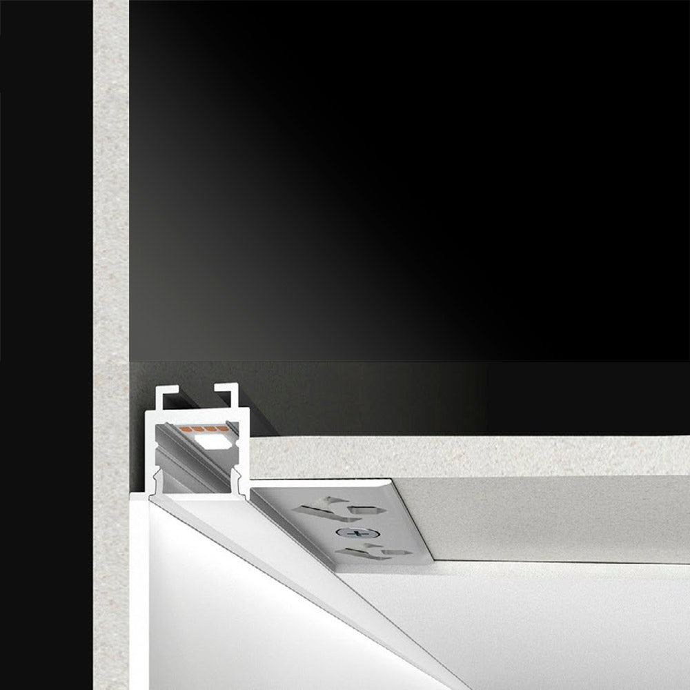 Perfil fabricado en aluminio de alta calidad ideal para iluminación de cualquier ambiente (baños, cocinas, pasillos, salones, etc) Se instala en obra entre el pladur, yeso, azulejos, etc. Dispone de aletas troqueladas que facilita la inserción del cemento u otro material para asegurar así un agarre perfecto a la pared.