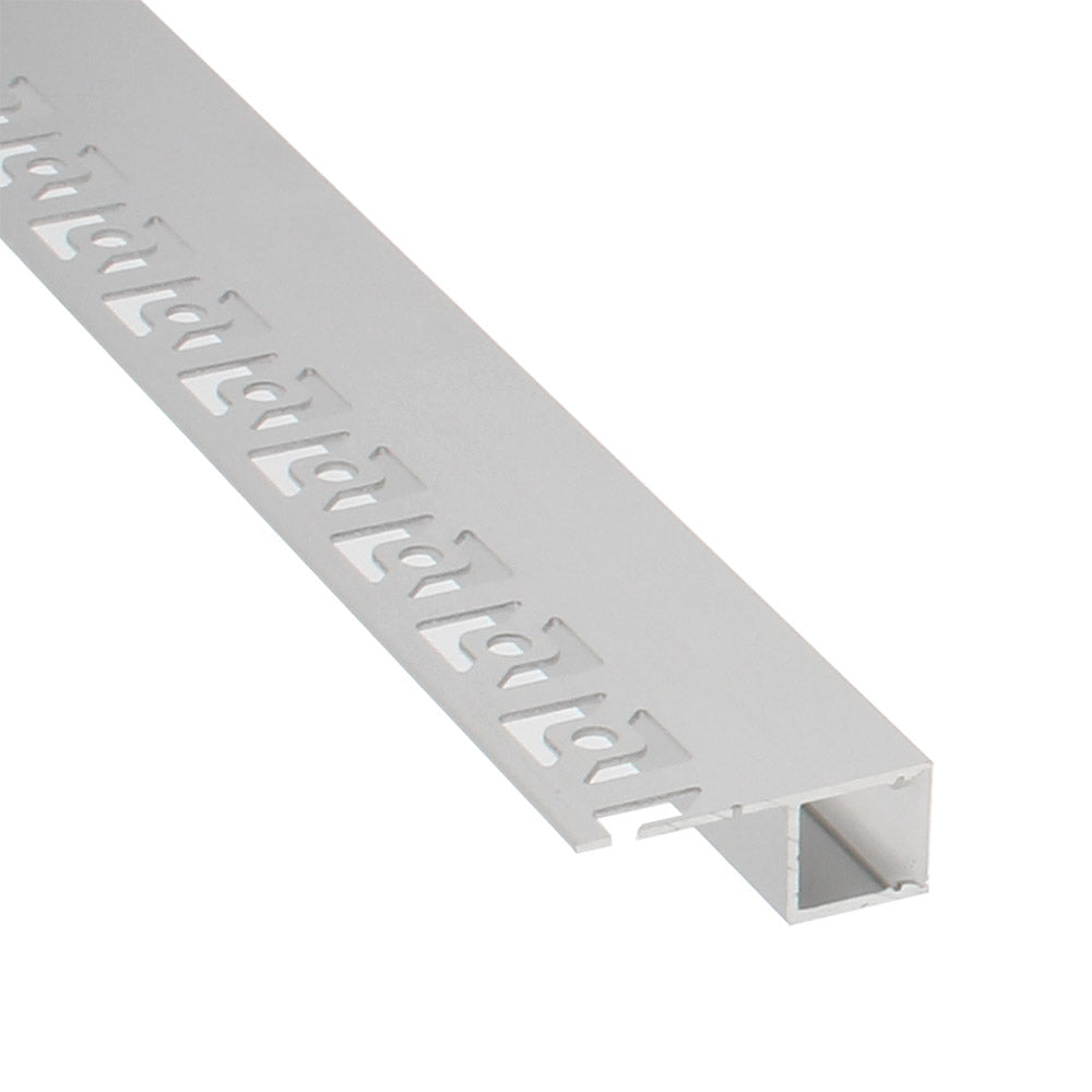 Perfil fabricado en aluminio de alta calidad ideal para iluminación de cualquier ambiente (baños, cocinas, pasillos, salones, etc) Se instala en obra entre el pladur, yeso, azulejos, etc. Dispone de aletas troqueladas que facilita la inserción del cemento u otro material para asegurar así un agarre perfecto a la pared.
