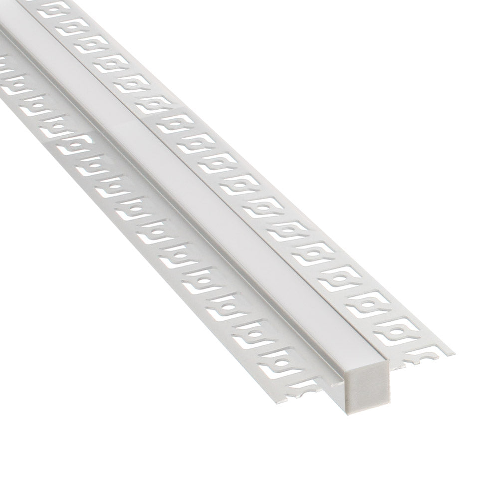 Perfil fabricado en aluminio de alta calidad ideal para iluminación de cualquier ambiente (baños, cocinas, pasillos, salones, etc) Se instala en obra entre el pladur, yeso, azulejos, etc. Dispone de aletas troqueladas que facilita la inserción del cemento u otro material para asegurar así un agarre perfecto a la pared.