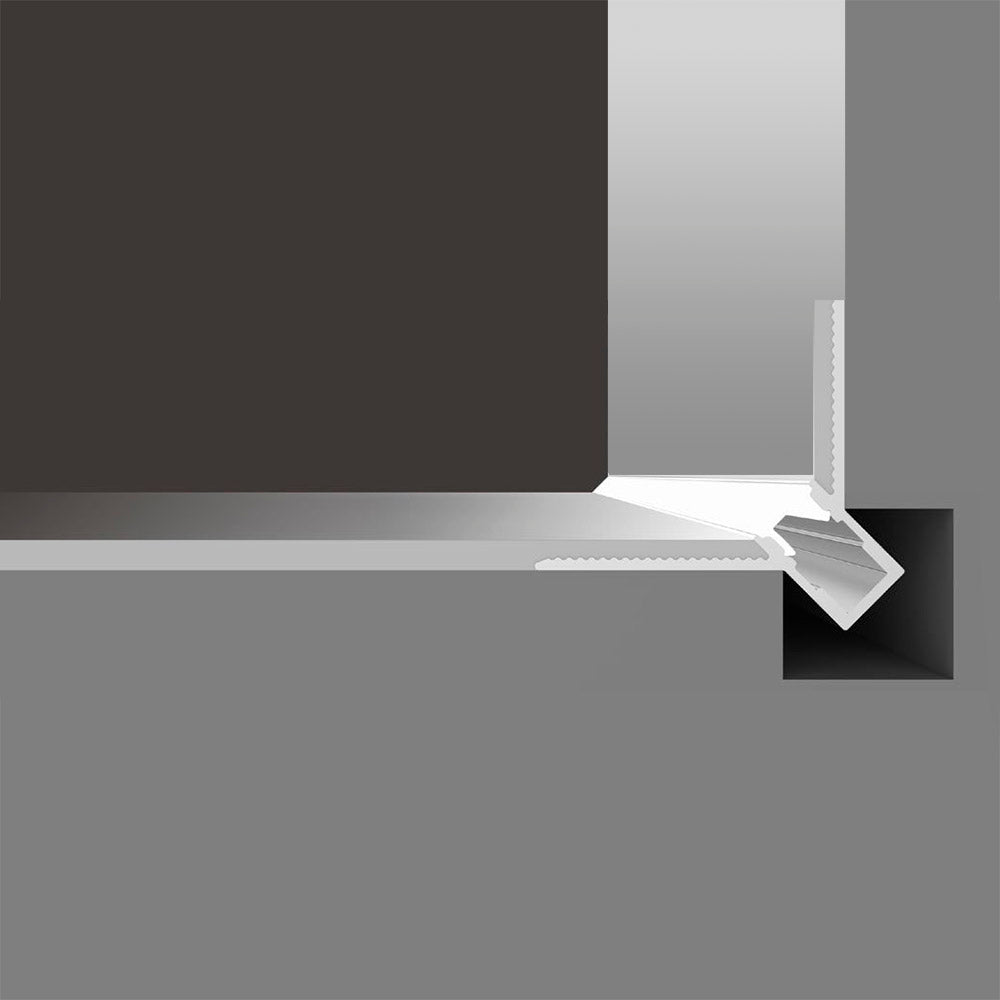 Perfil fabricado en aluminio de alta calidad ideal para iluminación de cualquier ambiente (baños, cocinas, pasillos, salones, etc) Se instala en obra entre el pladur, yeso, azulejos, etc. Dispone de aletas troqueladas que facilita la inserción del cemento u otro material para asegurar así un agarre perfecto a la pared.