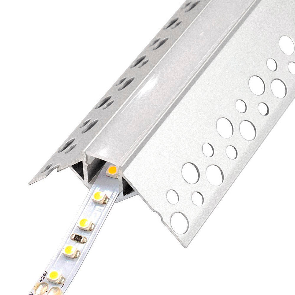 Perfil fabricado en aluminio de alta calidad ideal para iluminación de cualquier ambiente (baños, cocinas, pasillos, salones, etc) Se instala en obra entre el pladur, yeso, azulejos, etc. Dispone de aletas troqueladas que facilita la inserción del cemento u otro material para asegurar así un agarre perfecto a la pared.