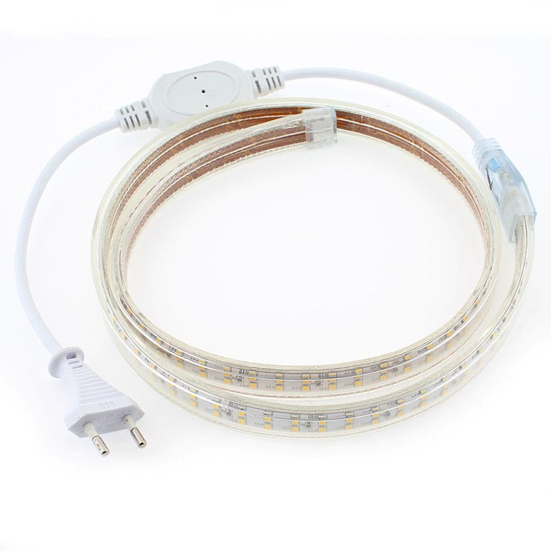 Tira led de 1 metro de doble tira LED flexible SMD2835 de alta tensión que se conecta directamente a la red eléctrica de 220V mediante un alimentador, está fabricada con componentes de alta calidad, permite una alta disipación del calor y son impermeables gracias a la cubierta transparente de PVC. Por su flexibilidad y alta luminosidad es ideal para crear una iluminación de calidad en todo tipo de ambientes, tanto en interiores como en exteriores.