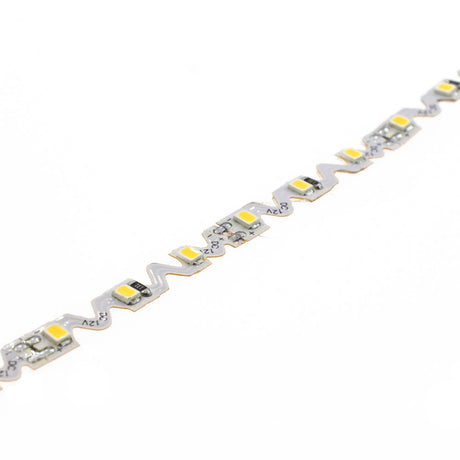 Rollo de tira LED monocolor de 5 metros (60 Leds/metro) especialmente indicado para la adaptarse a cualquier contorno, permite hacer curvas y ángulos 90 grados gracias a su PCB de solo 6mm de ancho en forma de Zig-Zag. Chip SMD2835 de bajo consumo. Material flexible adaptable a cualquier superficie. En el dorso cuenta con un potente adhesivo 3M troquelado con la misma forma que la tira led para colocar la tira en cualquier superficie.
